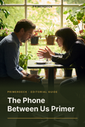 PrimerDeck cover: The Phone Between Us Primer: woman leans forward talking as a man across the table looks at his phone